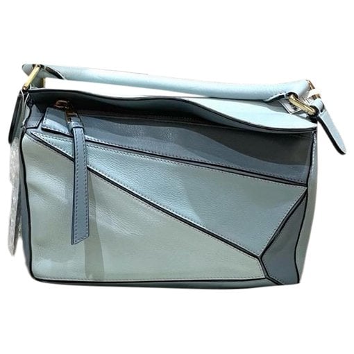 Puzzle leather handbag