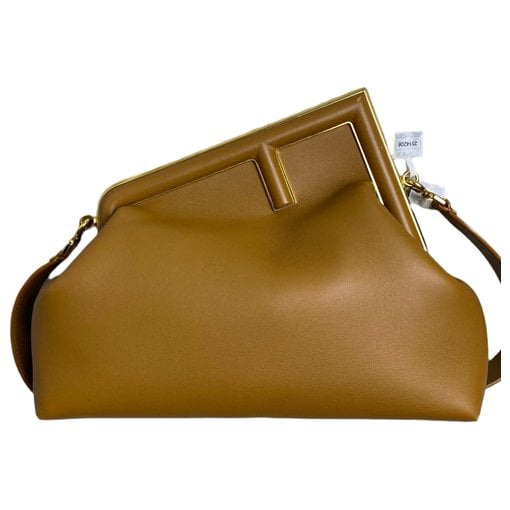 First leather handbag