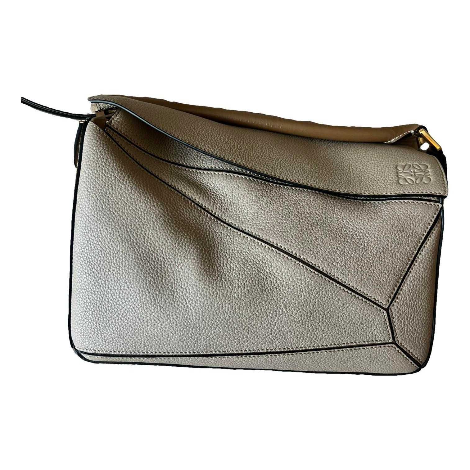 Puzzle leather handbag