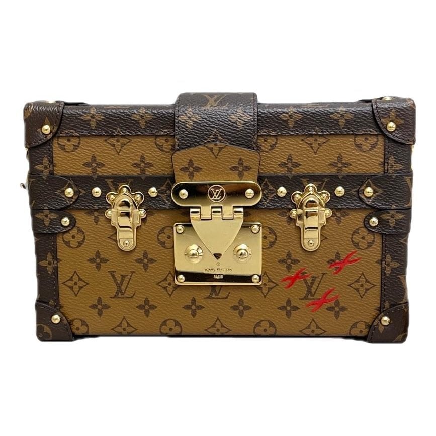 Petite Malle leather handbag
