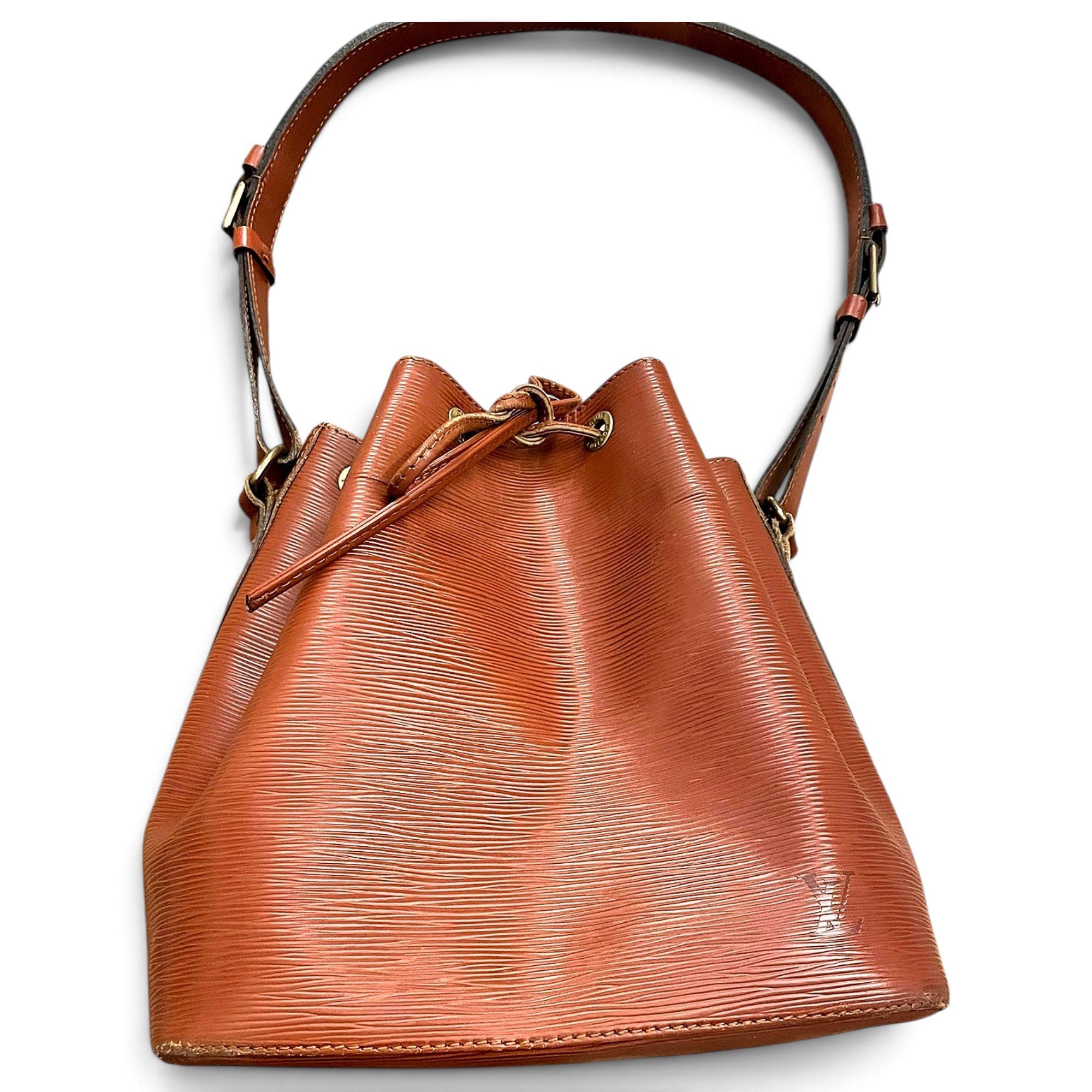 Louis Vuitton Noe leather clutch bag