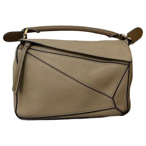 Puzzle leather handbag