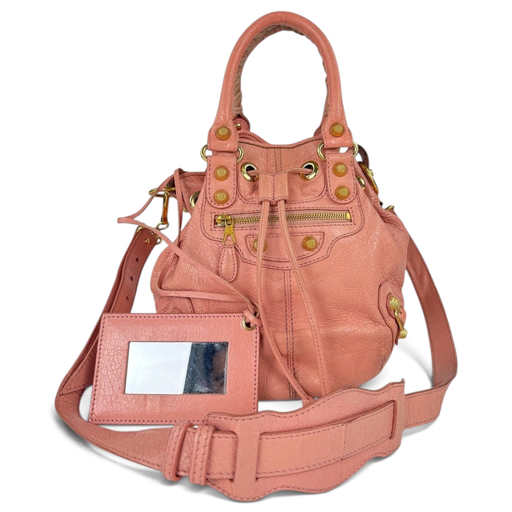 Pompon leather handbag