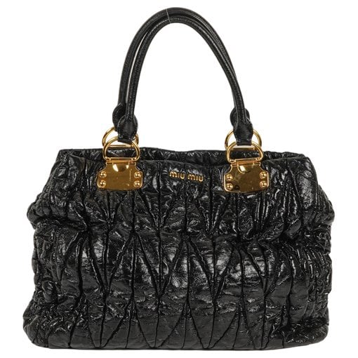 Matelassé patent leather handbag