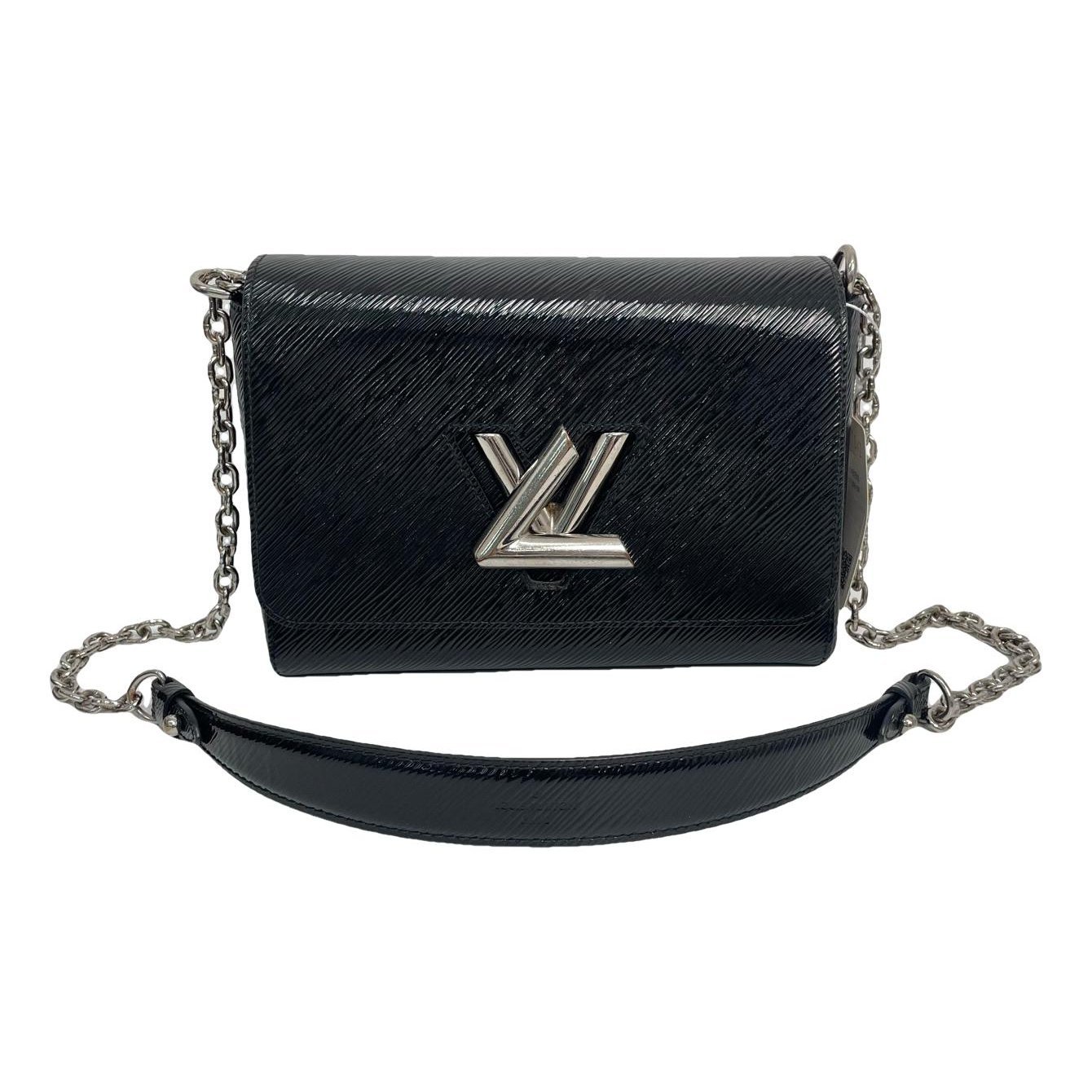 Twist patent leather handbag