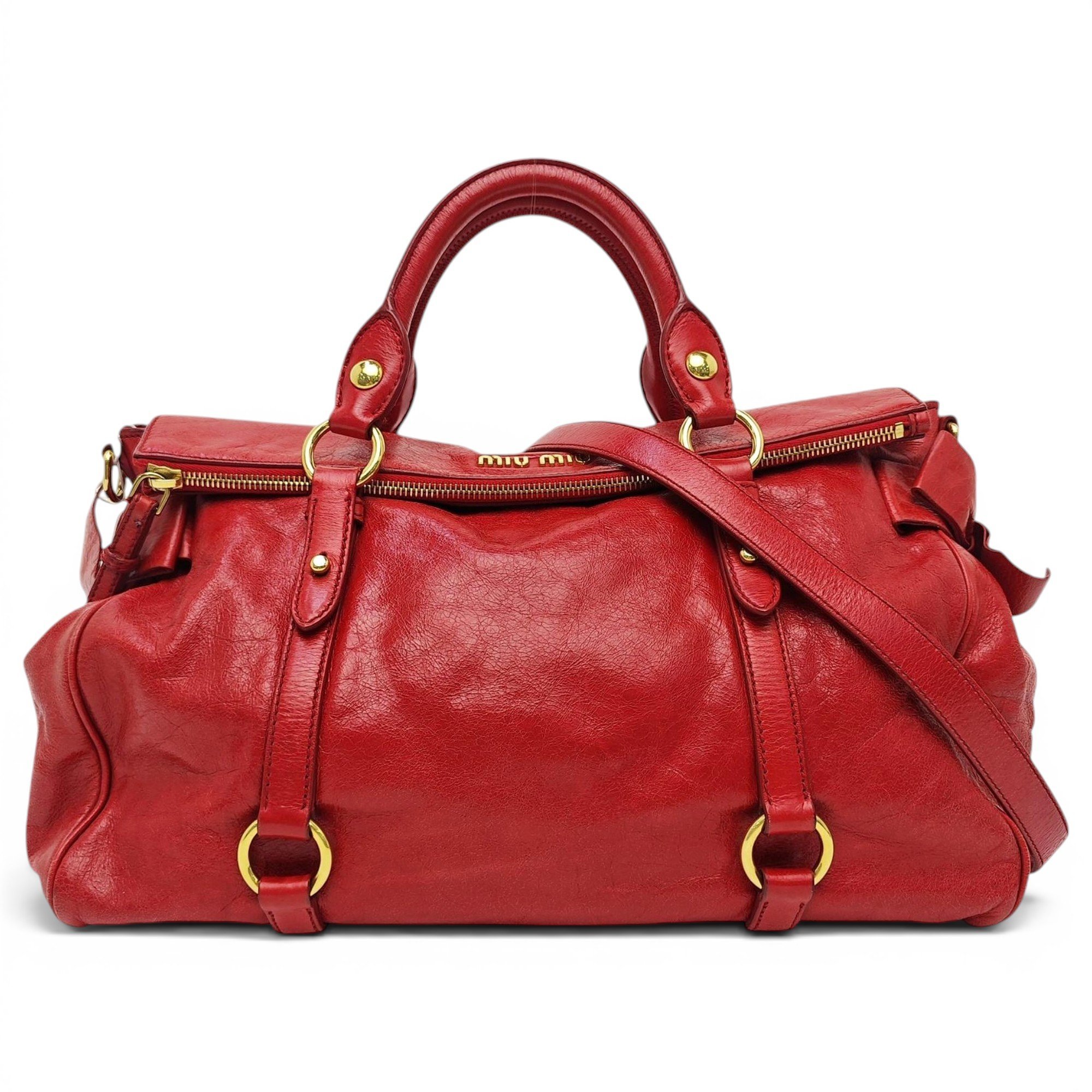 Bow bag leather handbag