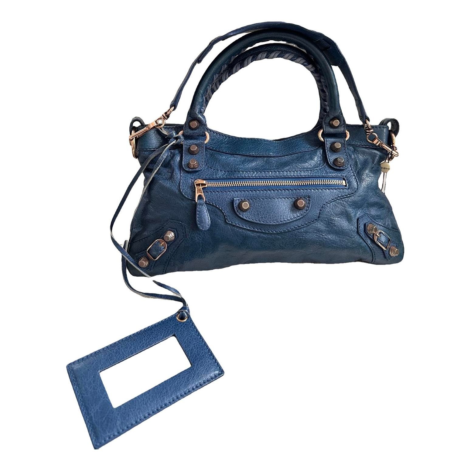 First leather handbag