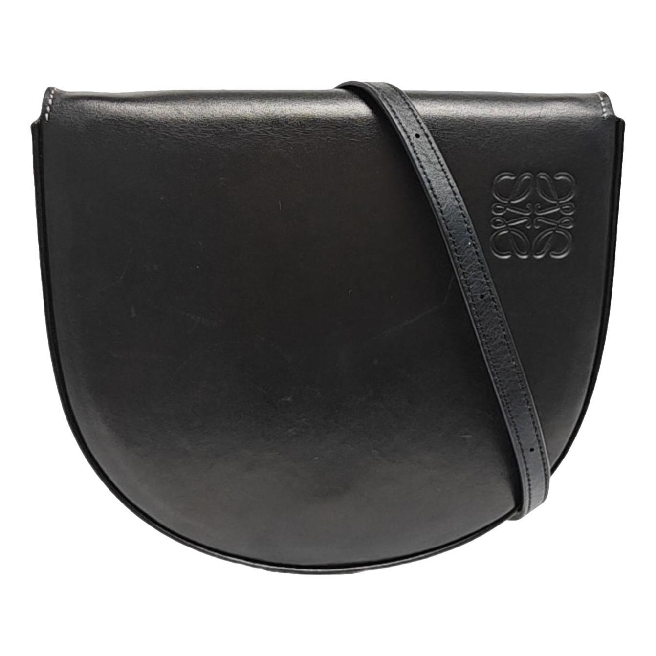 Heel leather handbag
