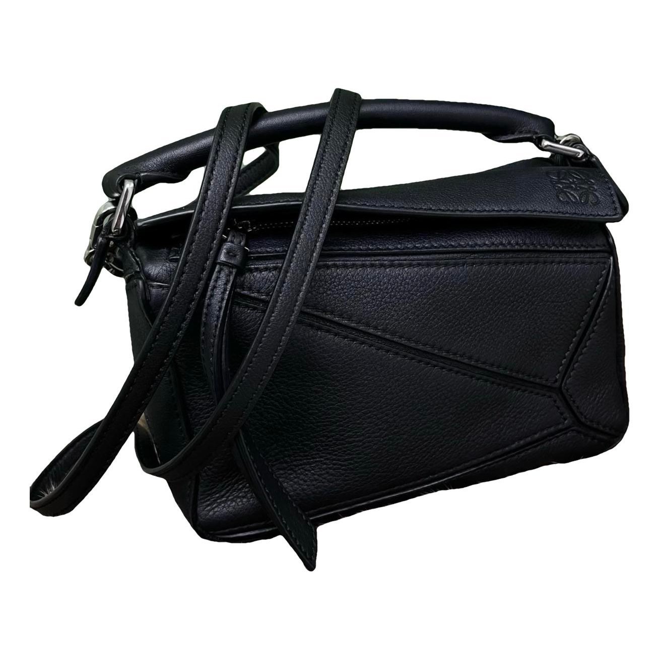 Puzzle leather handbag