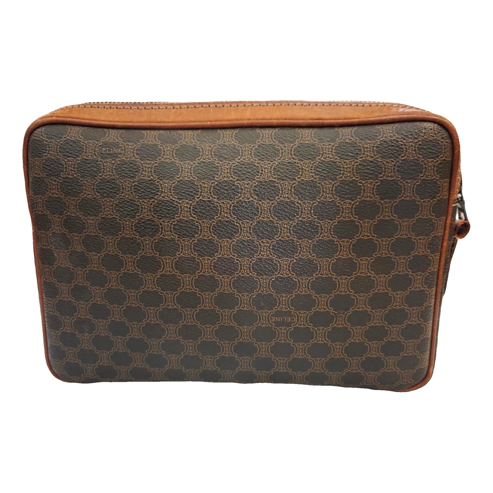 Triomphe Vintage leather clutch bag