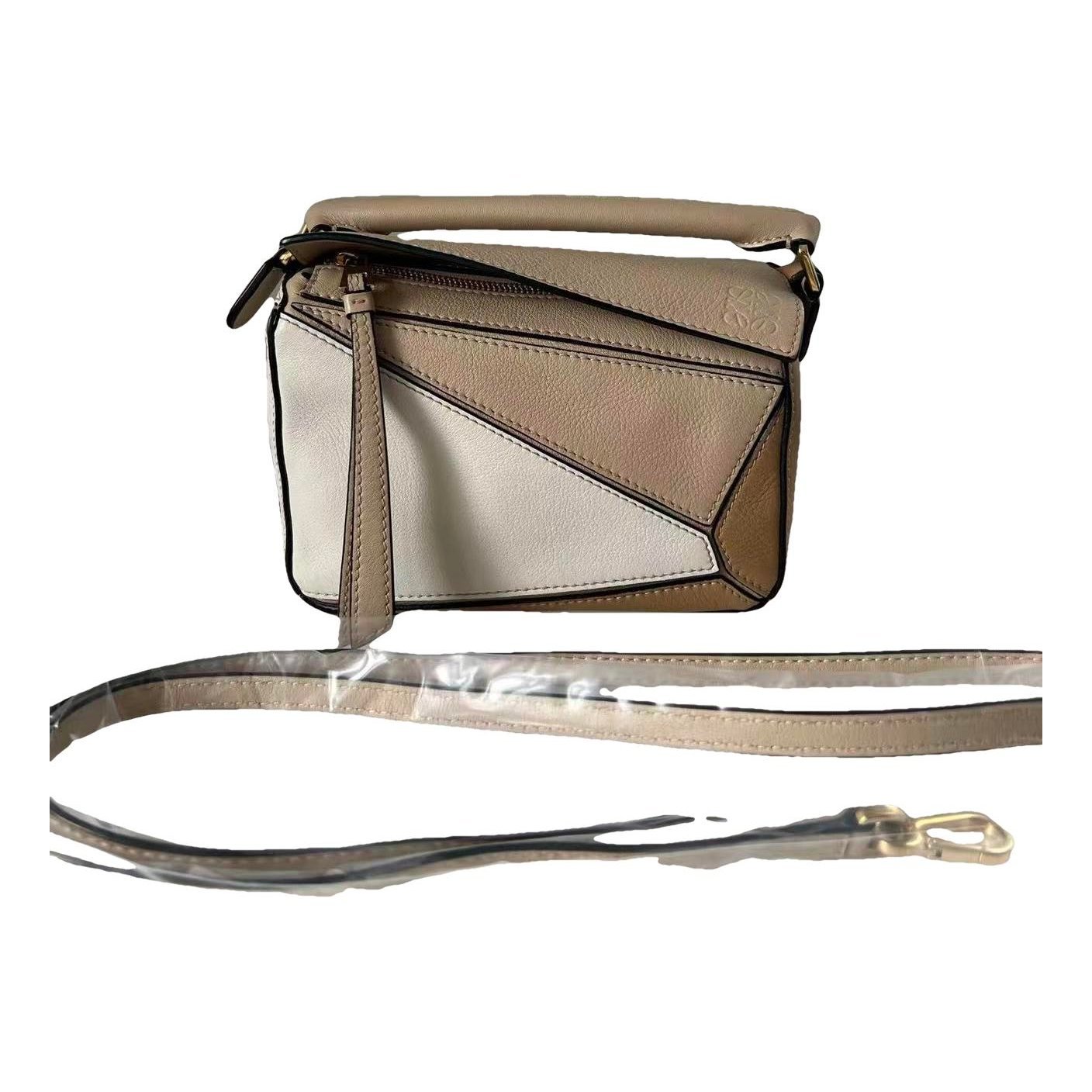 Puzzle leather handbag