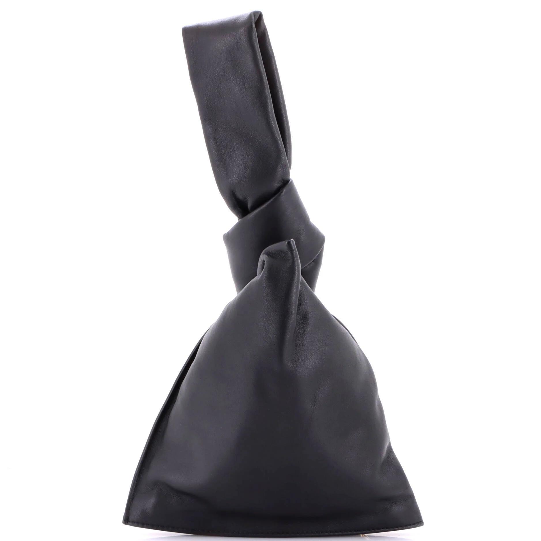 Twist leather clutch bag