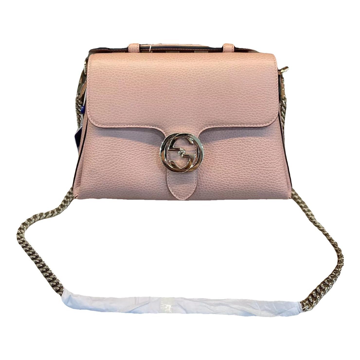 Interlocking leather handbag