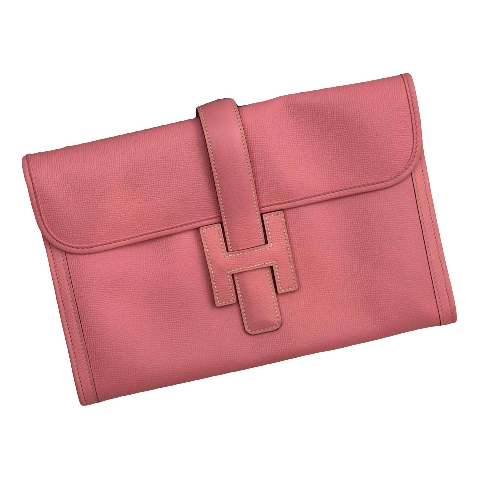 Jige leather clutch bag
