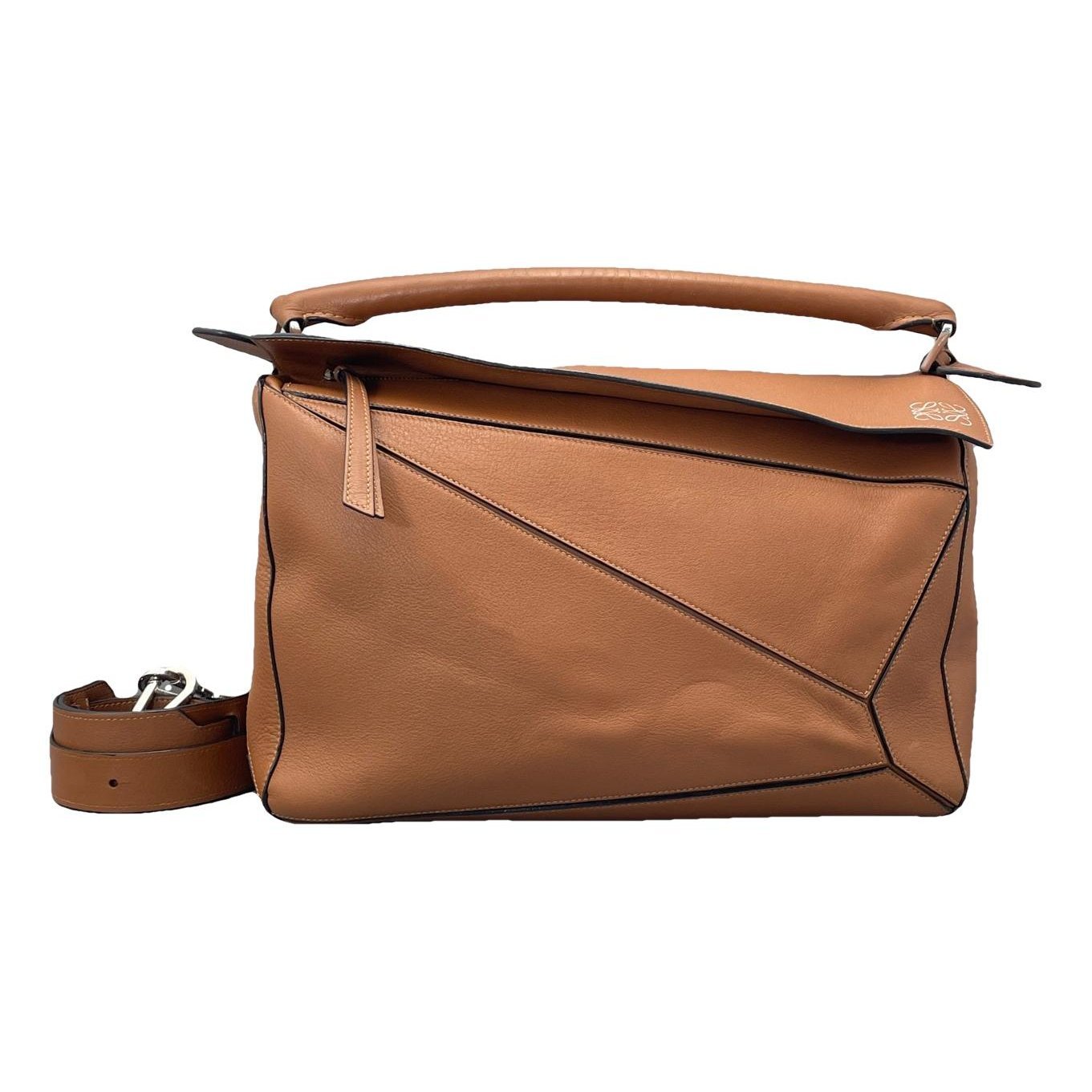 Puzzle leather handbag