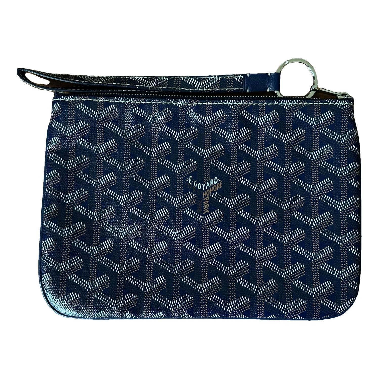 Sénat leather clutch bag