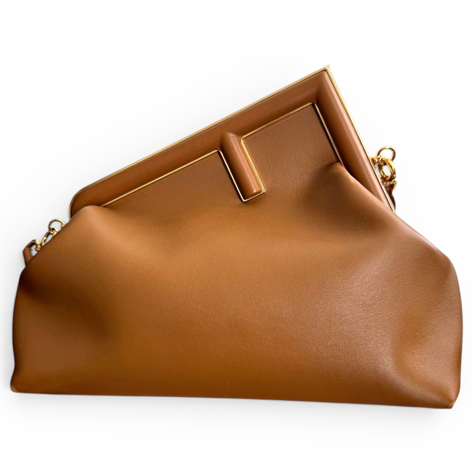 First leather crossbody bag