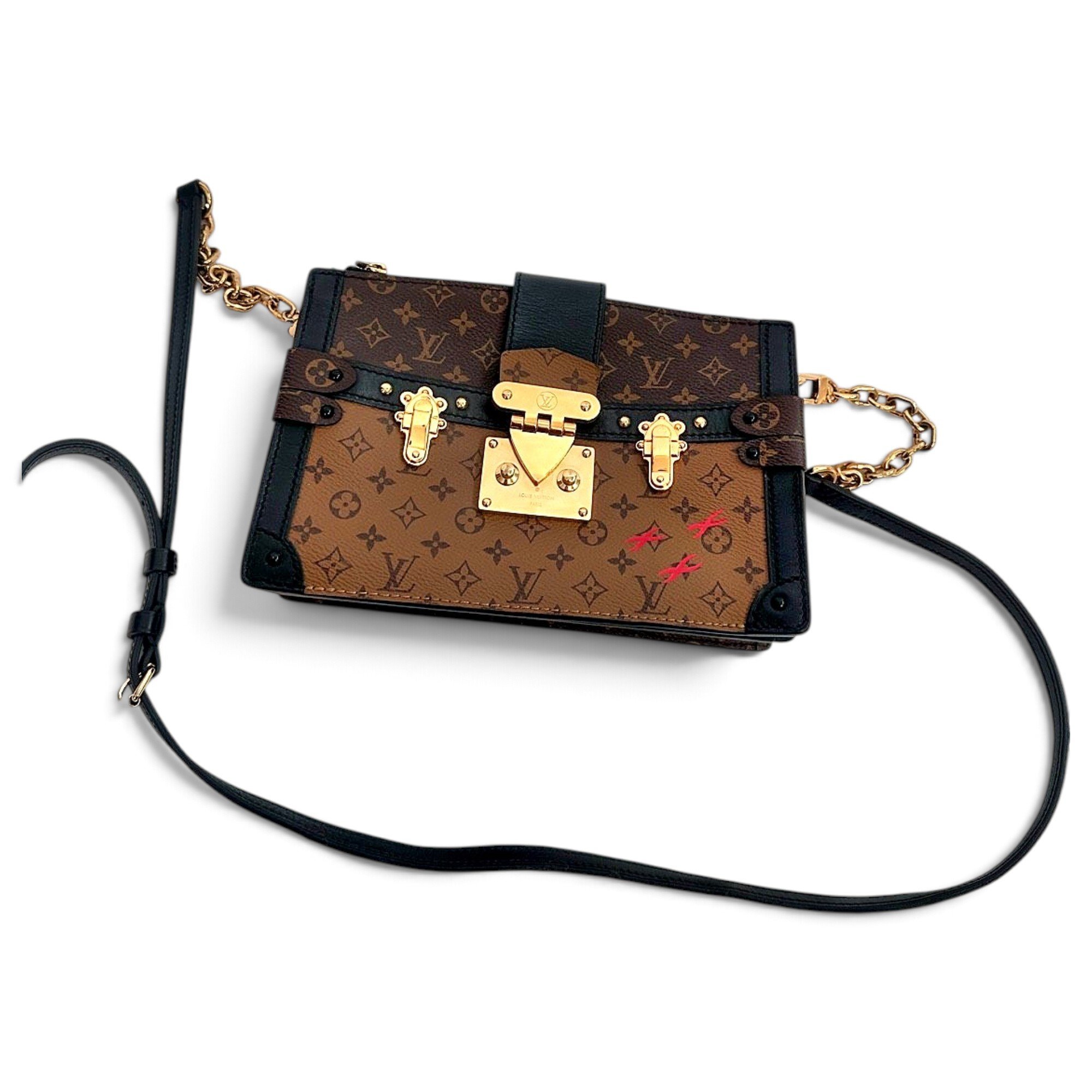 Pochette Trunk leather mini bag