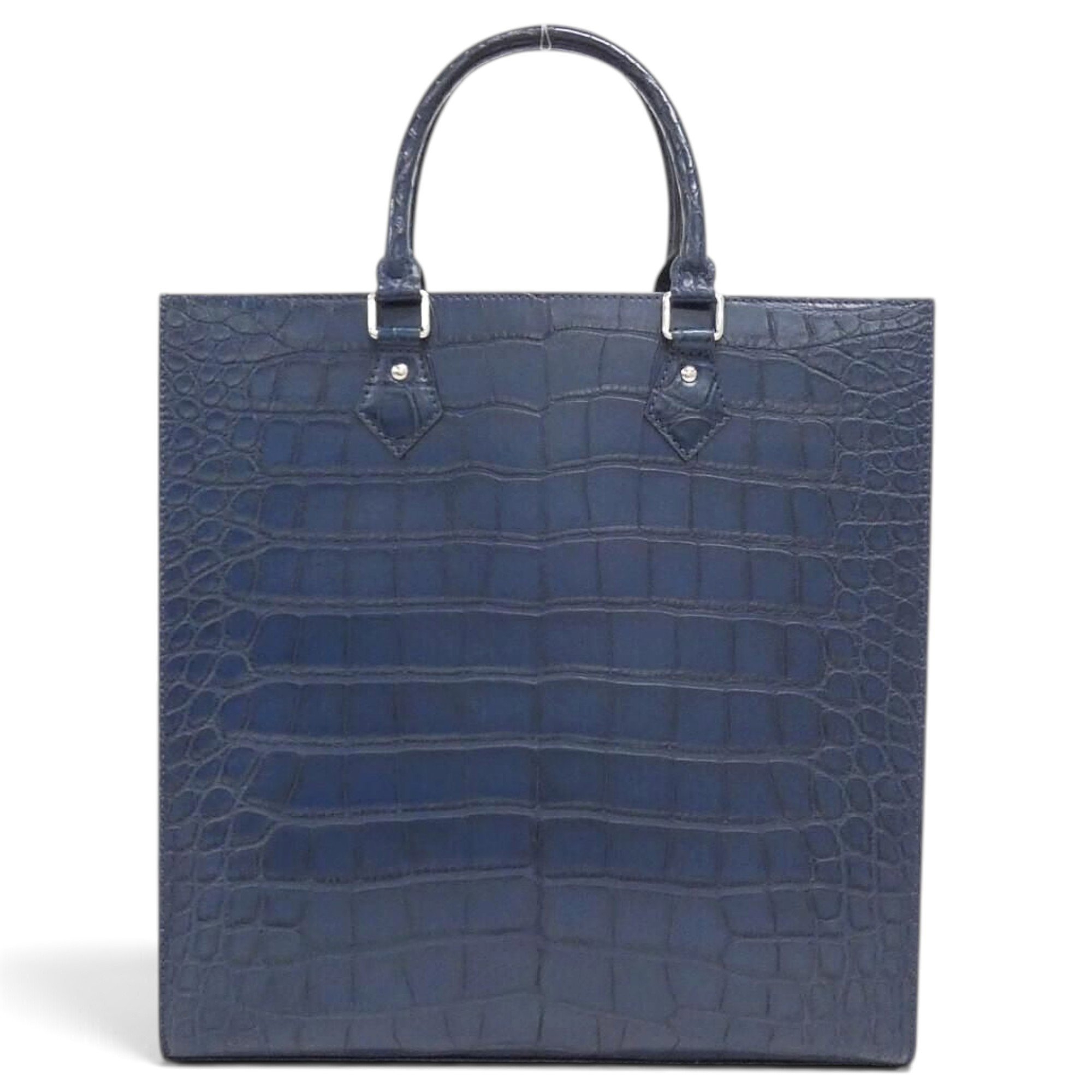Plat crocodile handbag
