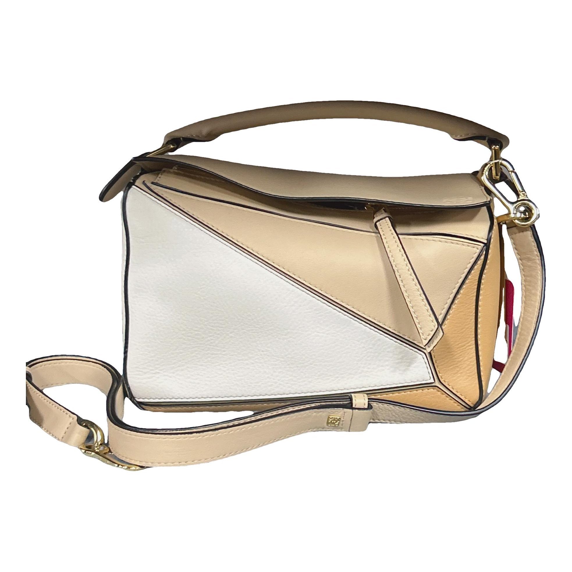 Puzzle leather handbag