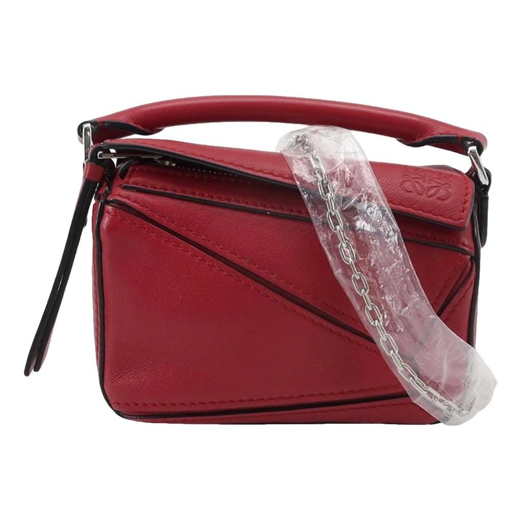 Puzzle leather handbag