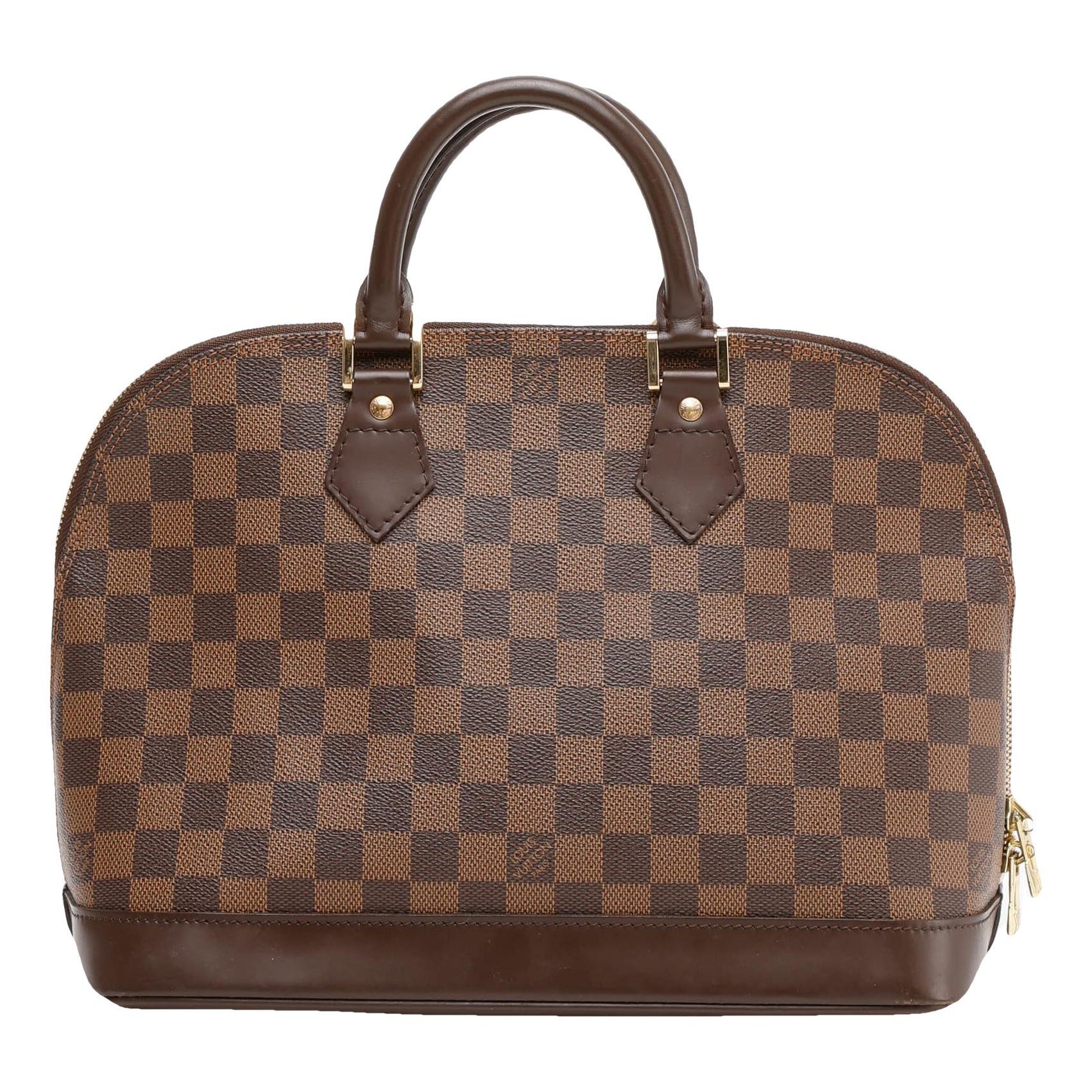 Louis Vuitton Alma cloth handbag