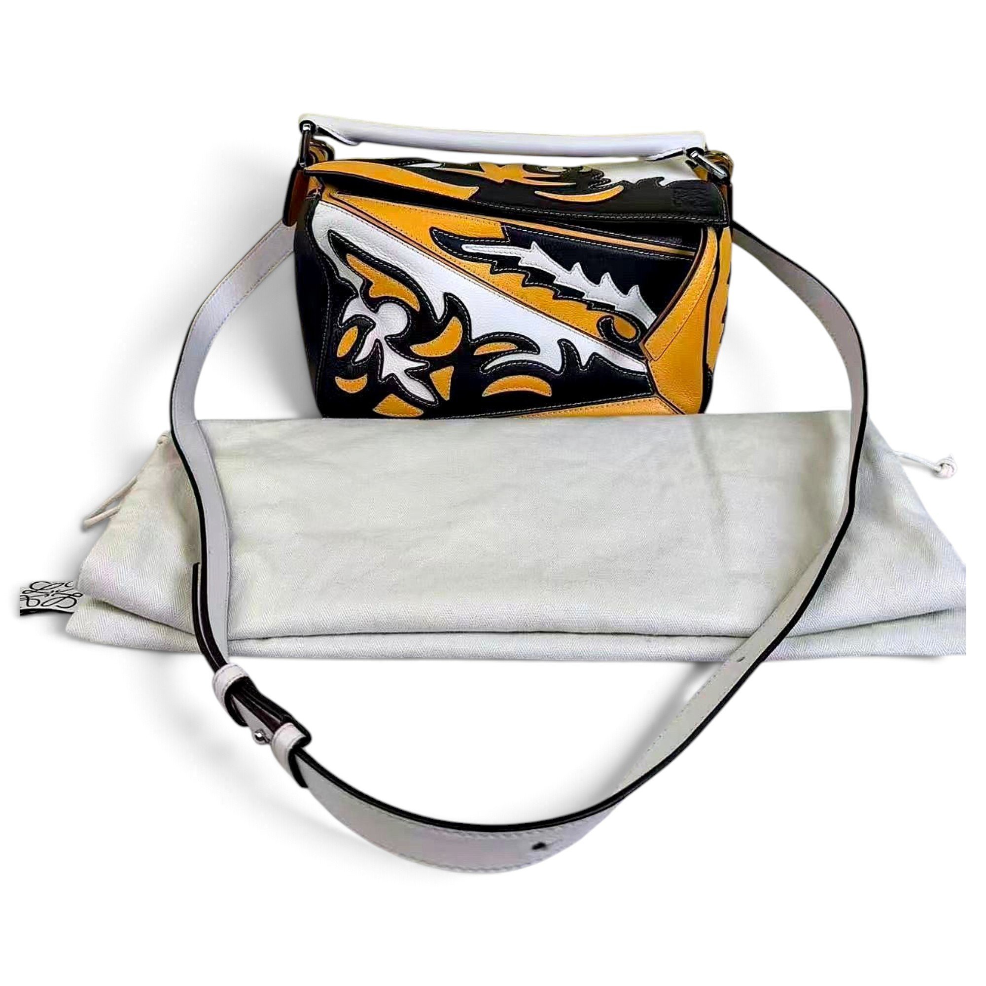 Puzzle leather handbag