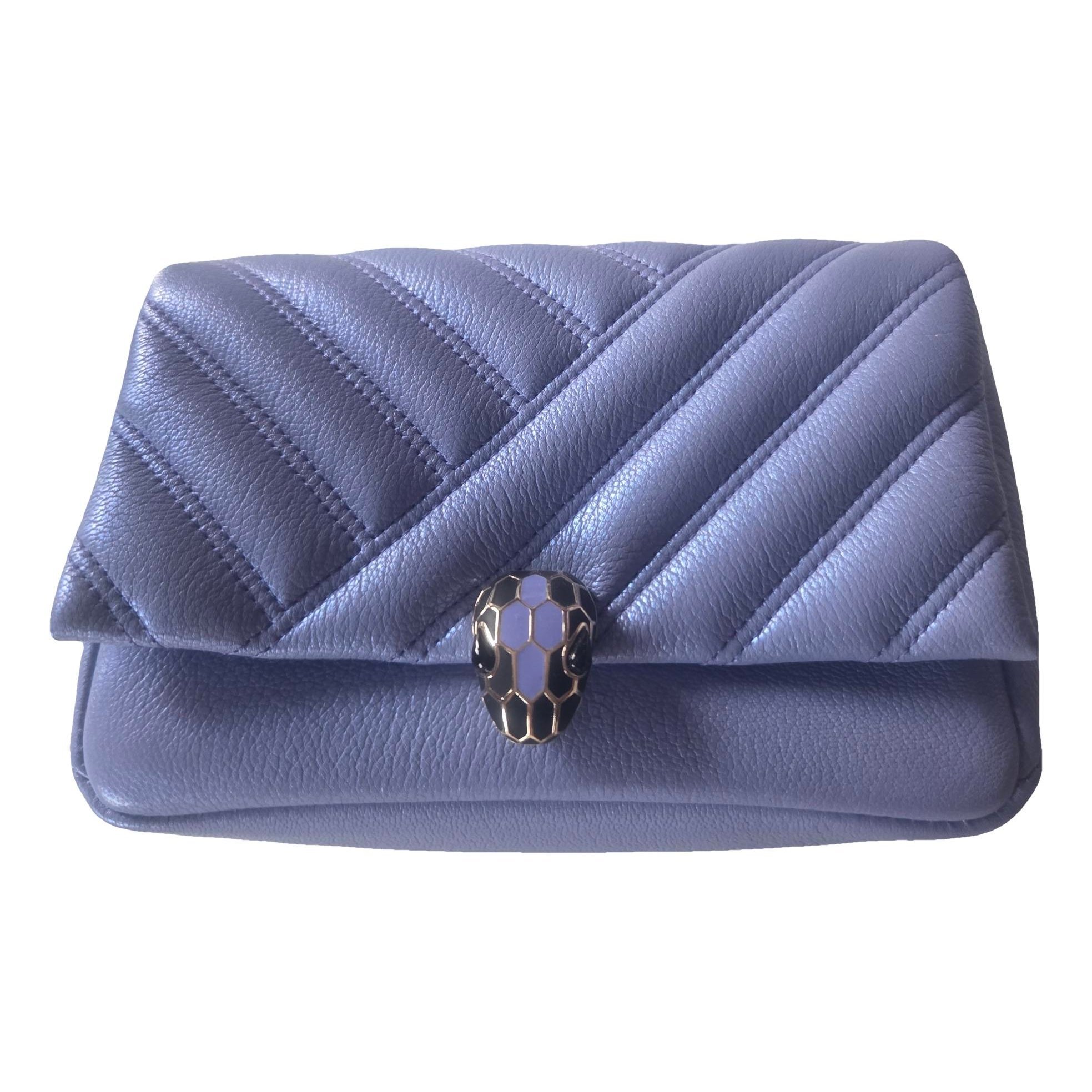 Serpenti leather clutch bag