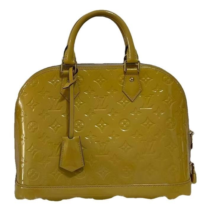 Alma BB patent leather handbag