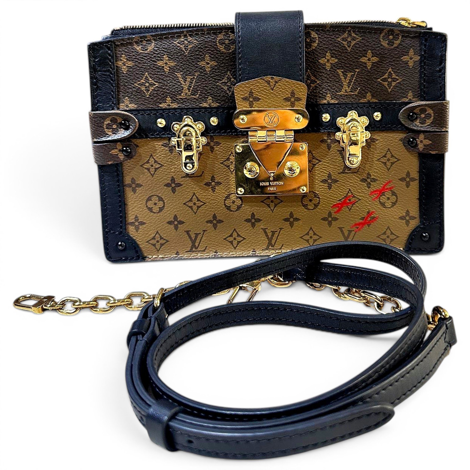 Pochette Trunk leather handbag