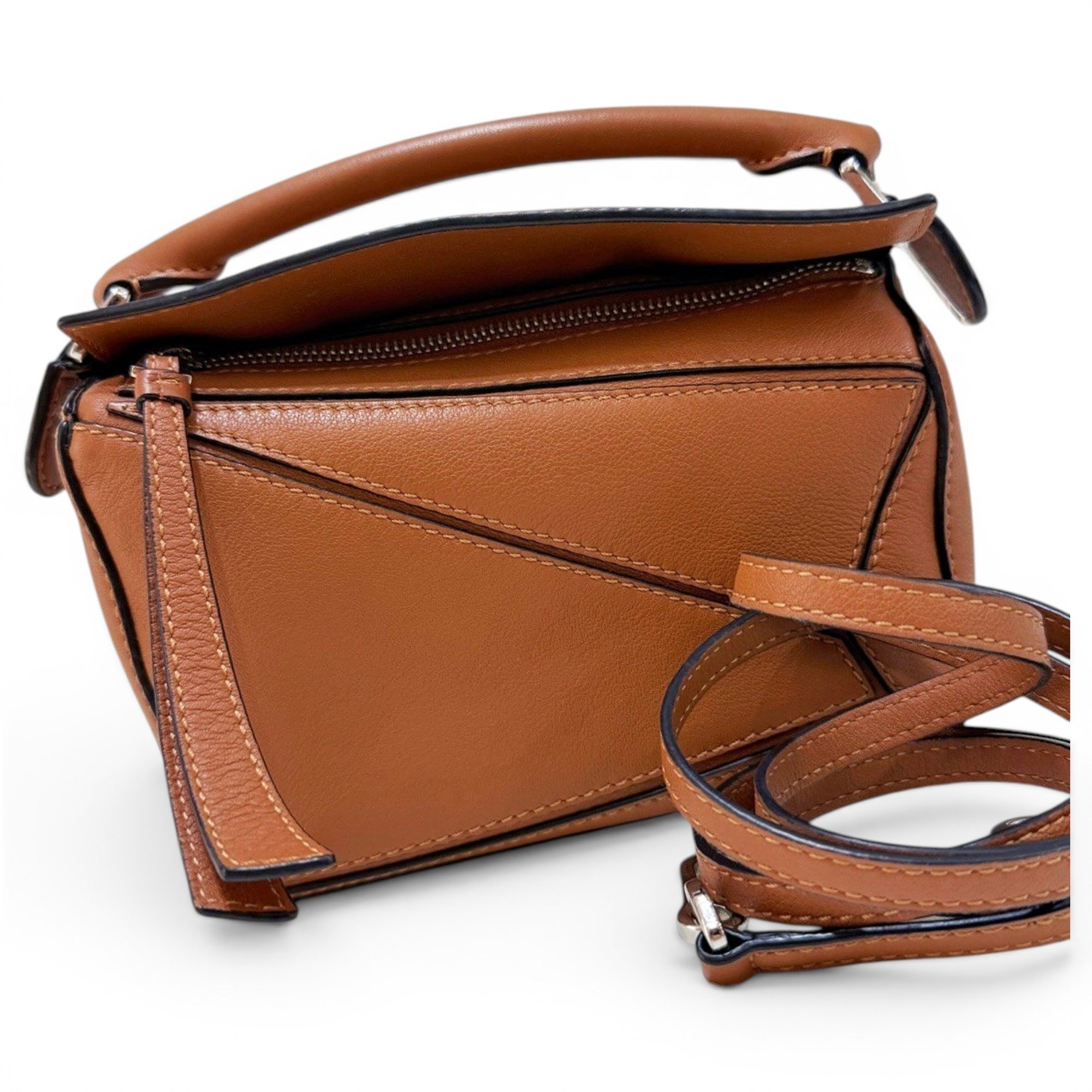 Puzzle leather handbag