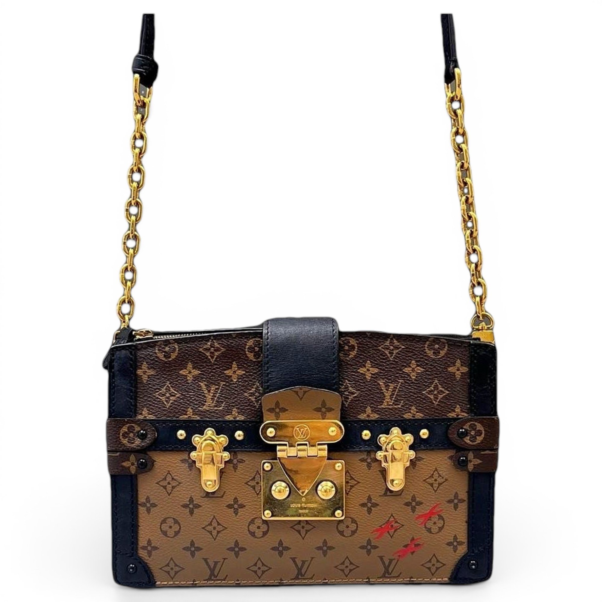 Pochette Trunk leather handbag