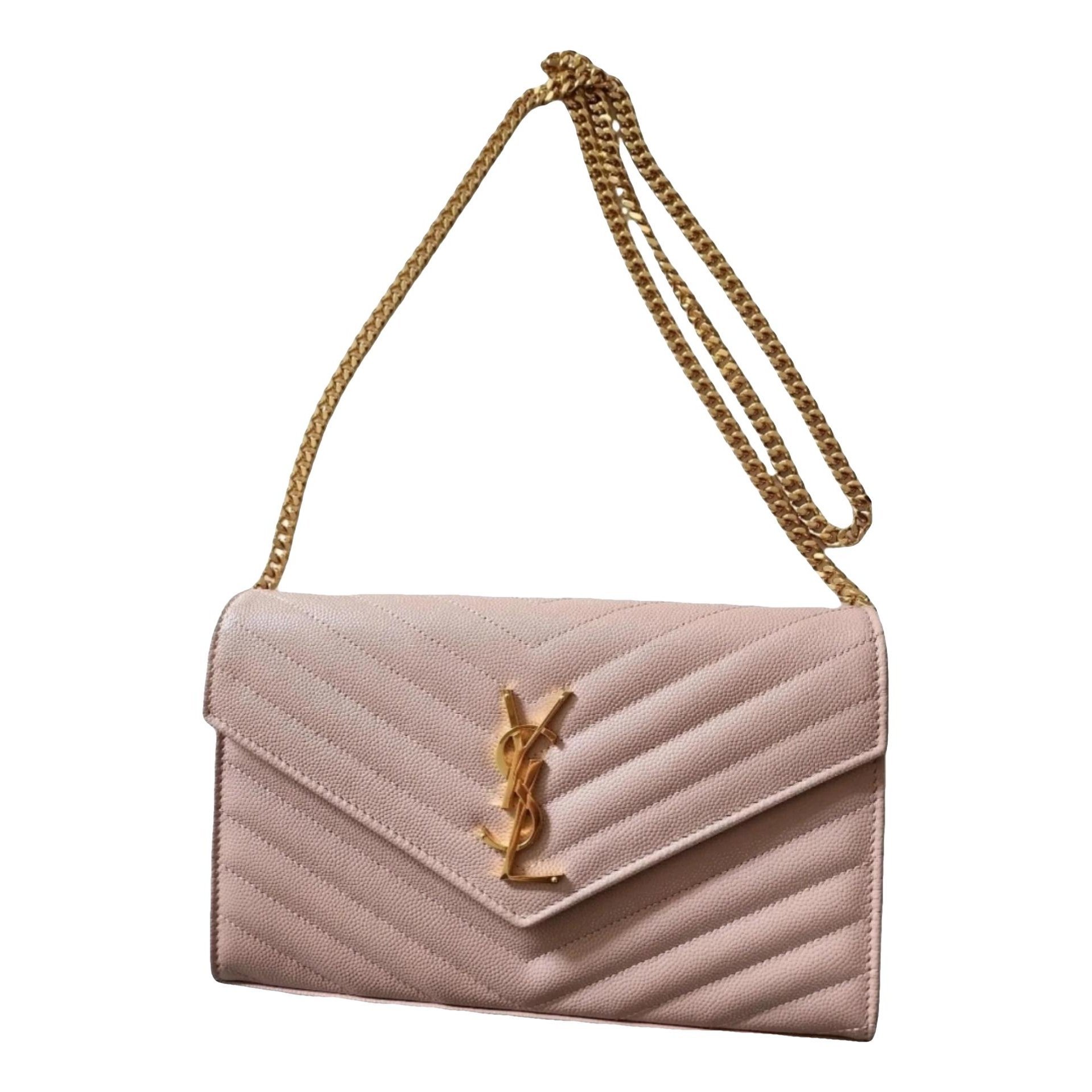 Cassandre leather clutch bag