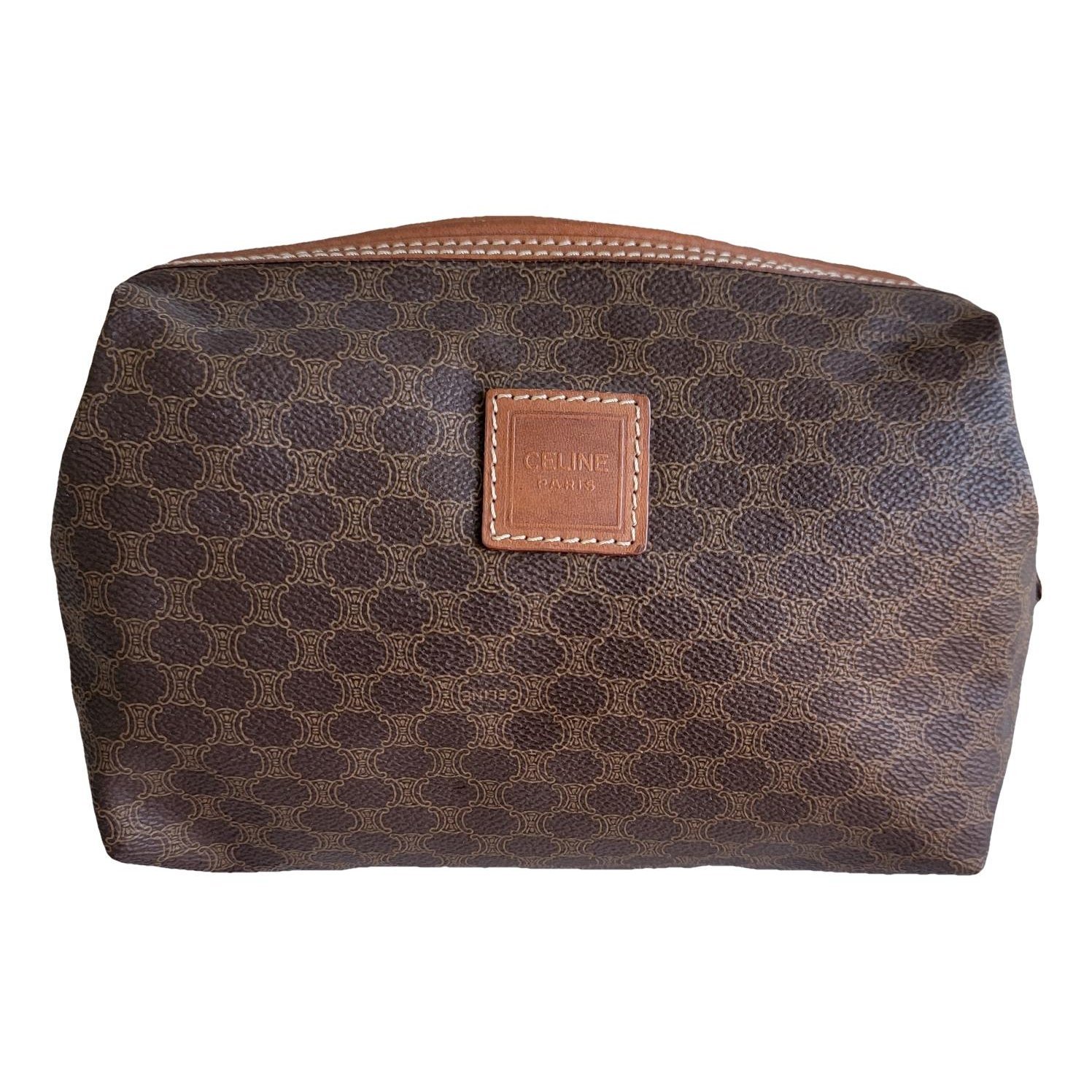 Triomphe Vintage leather clutch bag