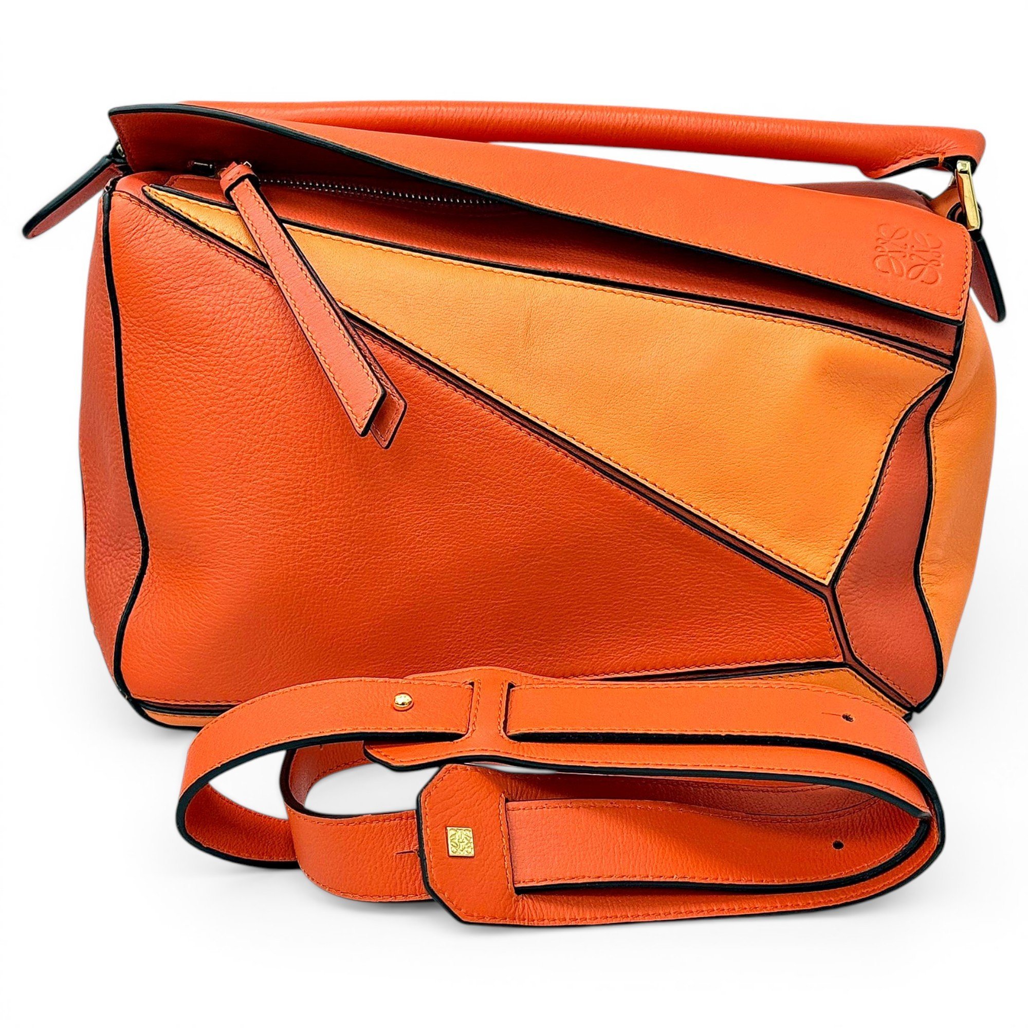 Puzzle leather handbag