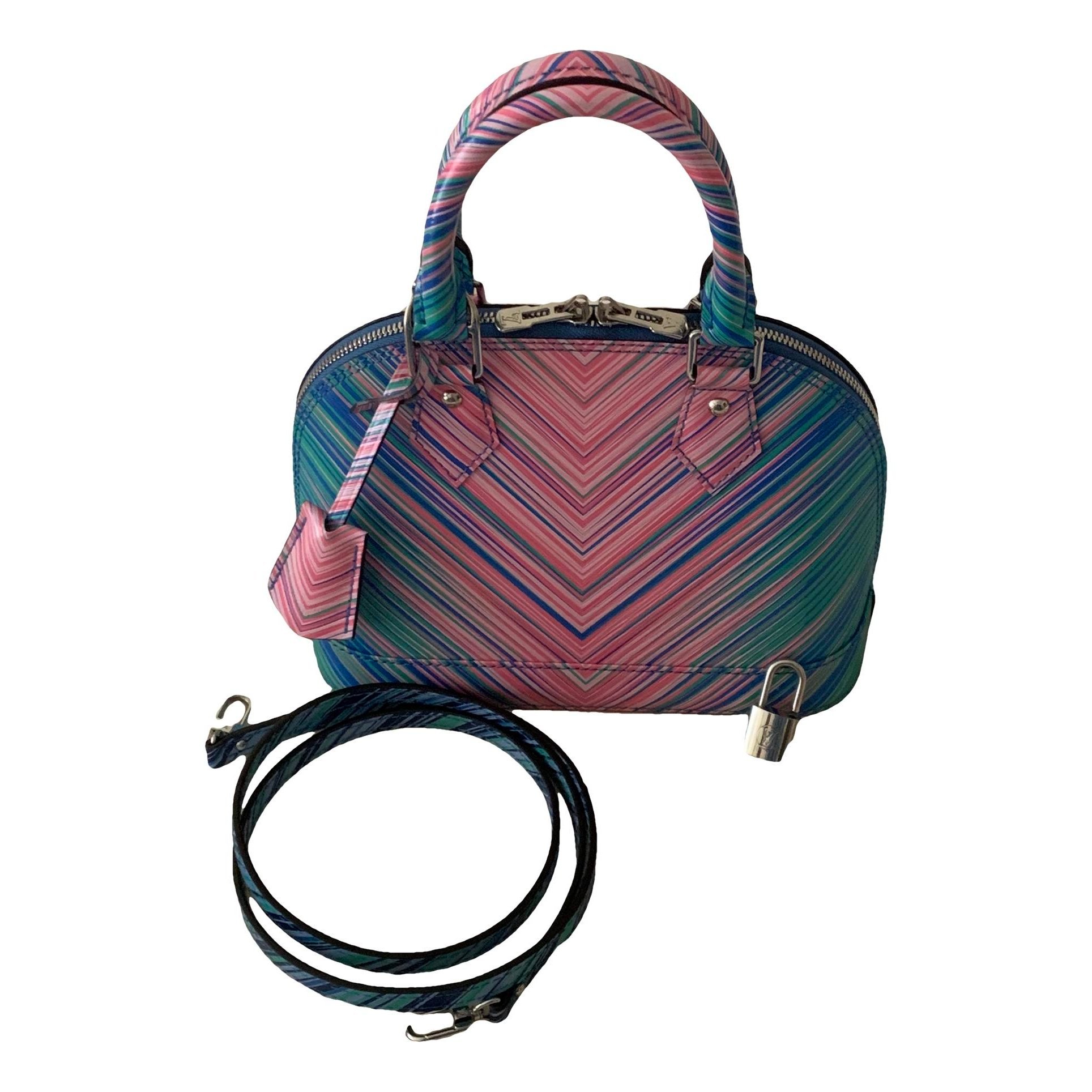 Louis Vuitton Alma BB patent leather handbag