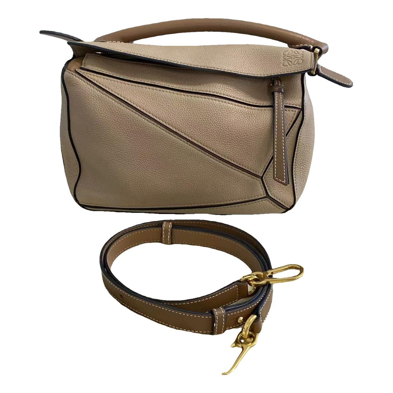 Puzzle leather handbag