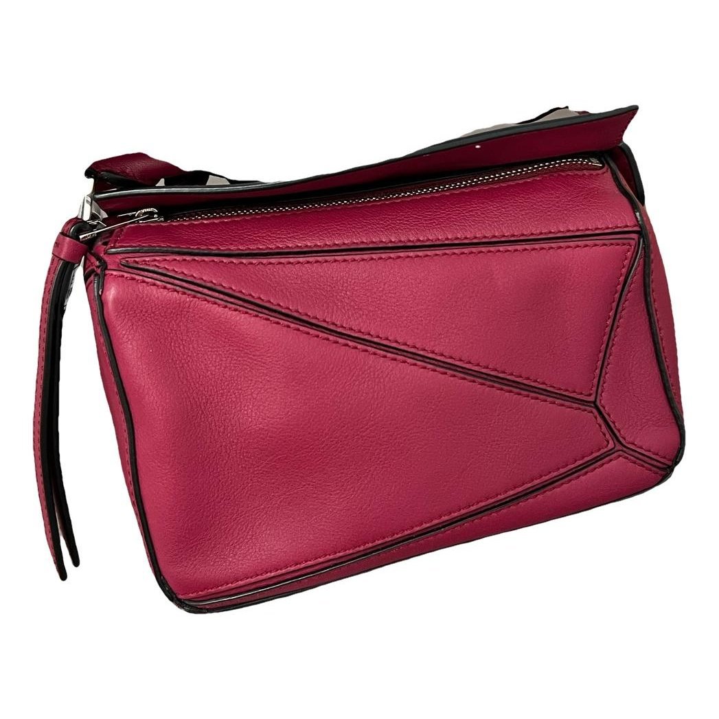 Puzzle leather handbag