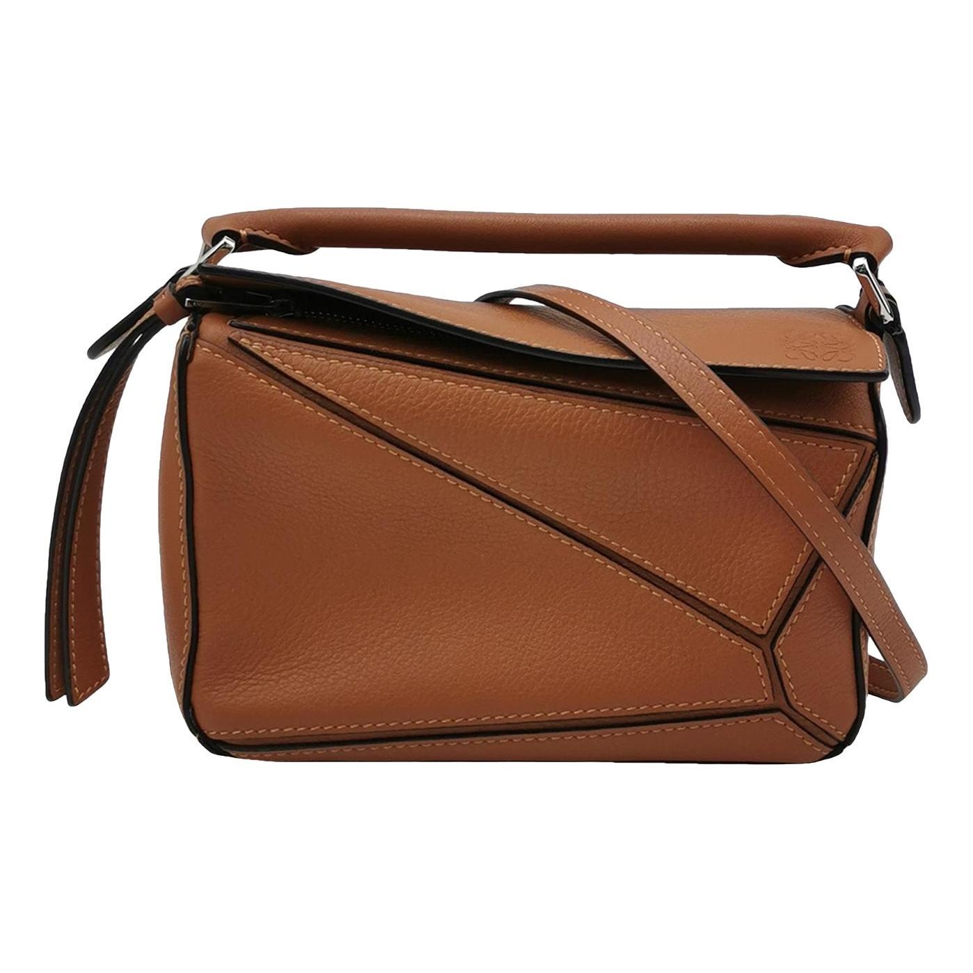 Puzzle leather crossbody bag