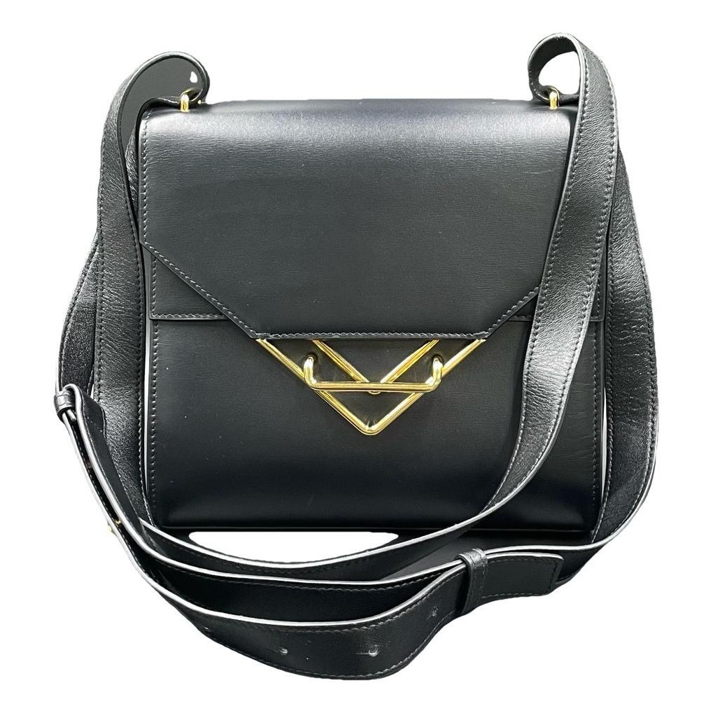 Clip leather handbag