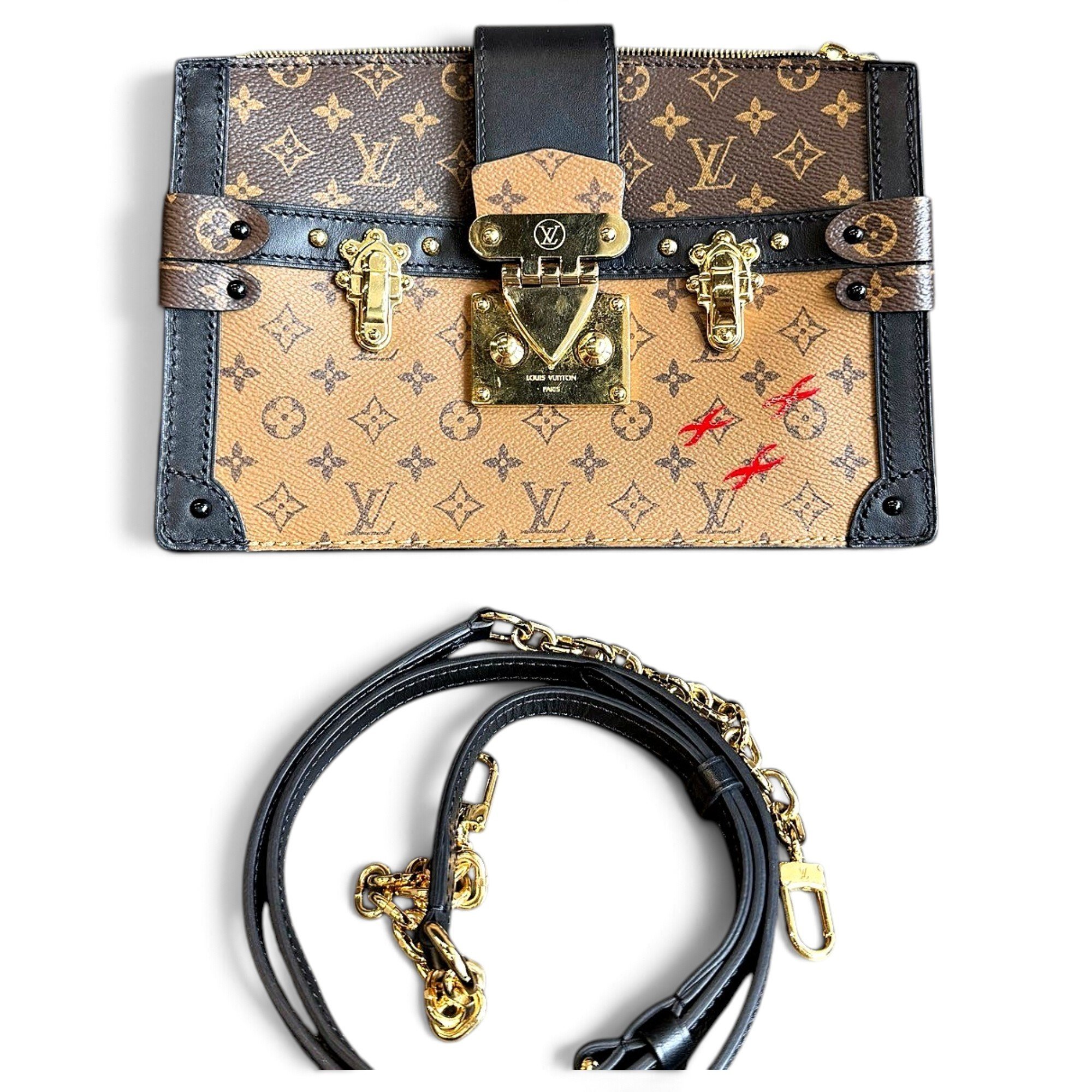 Pochette Trunk leather handbag