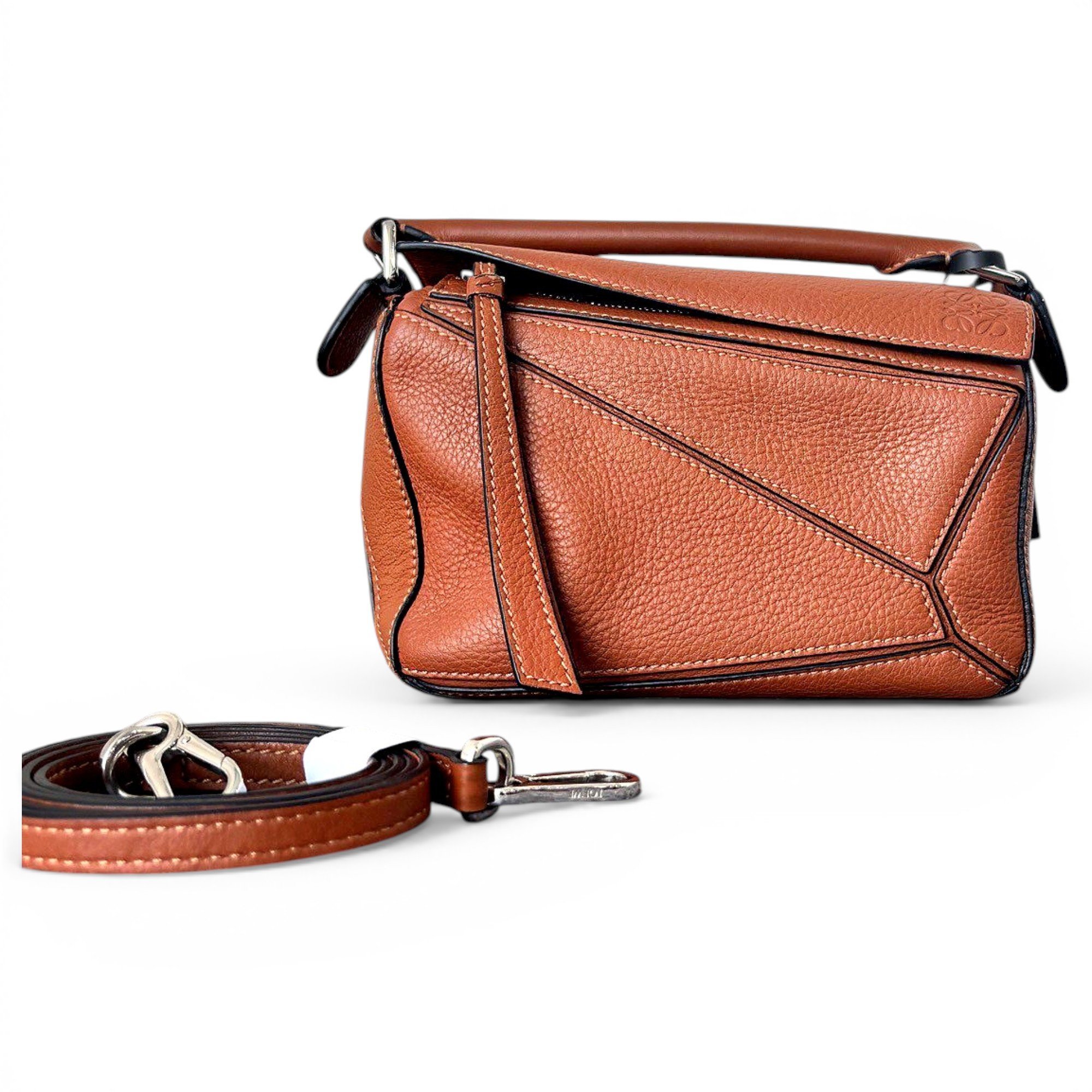 Puzzle leather handbag