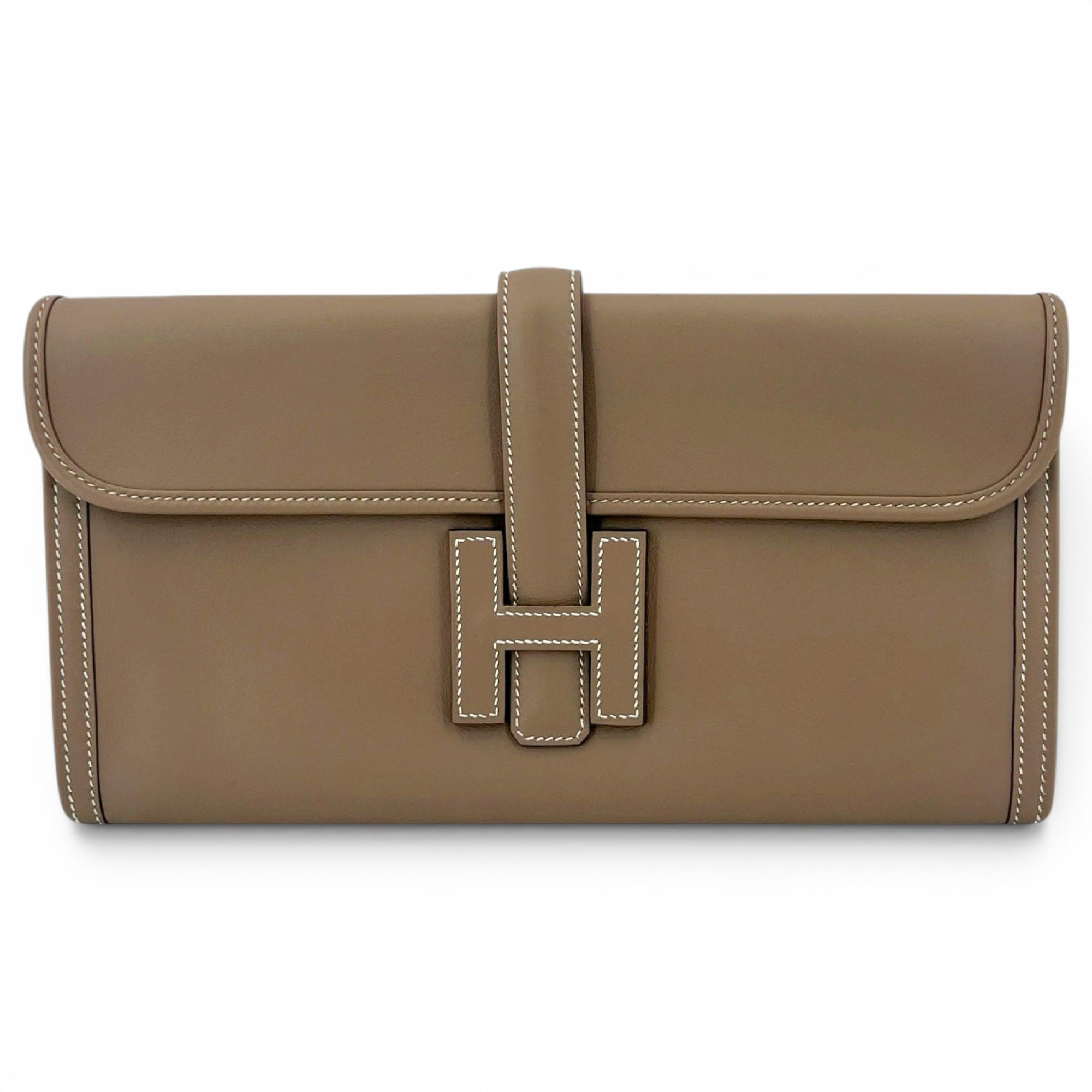 Jige leather clutch bag