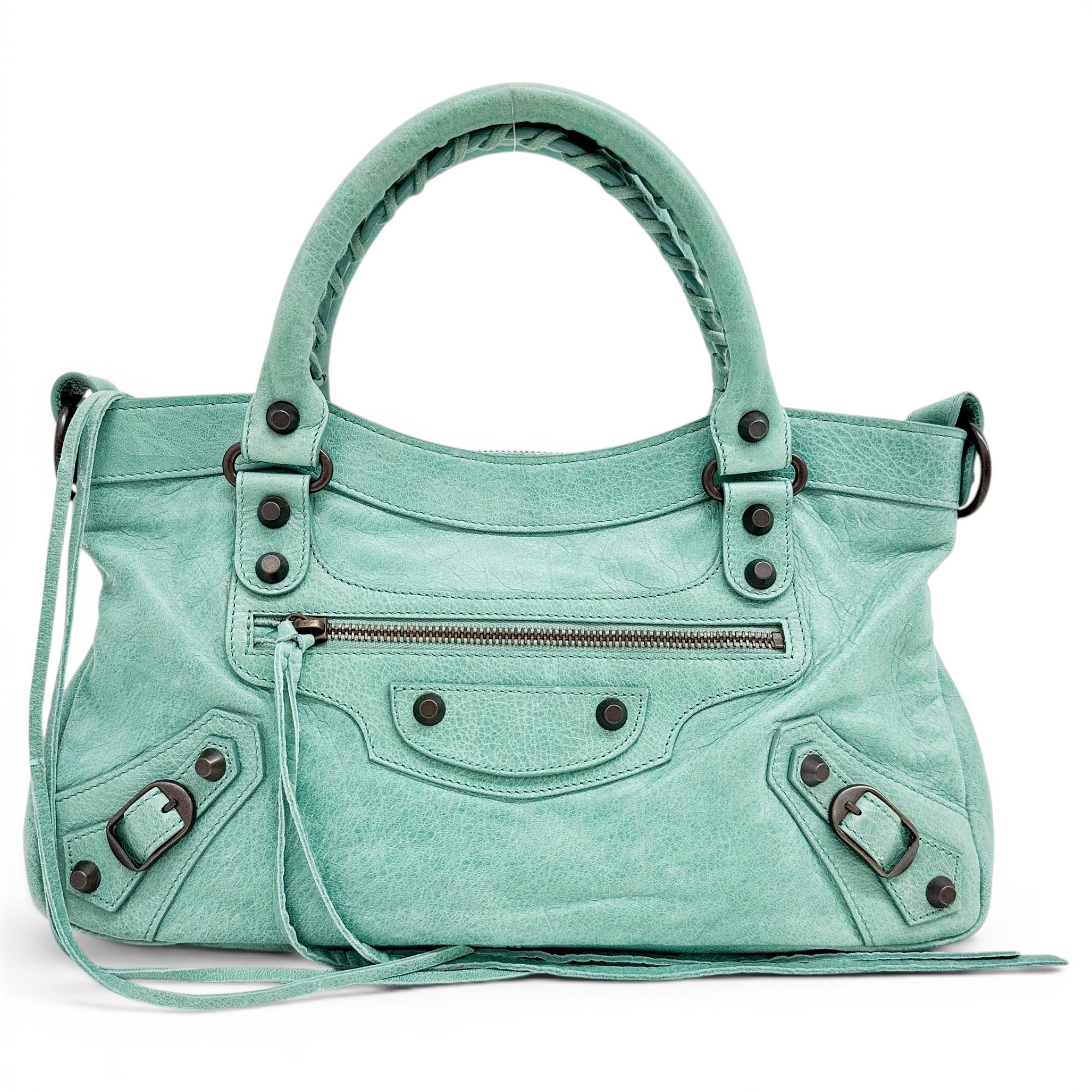 First leather handbag