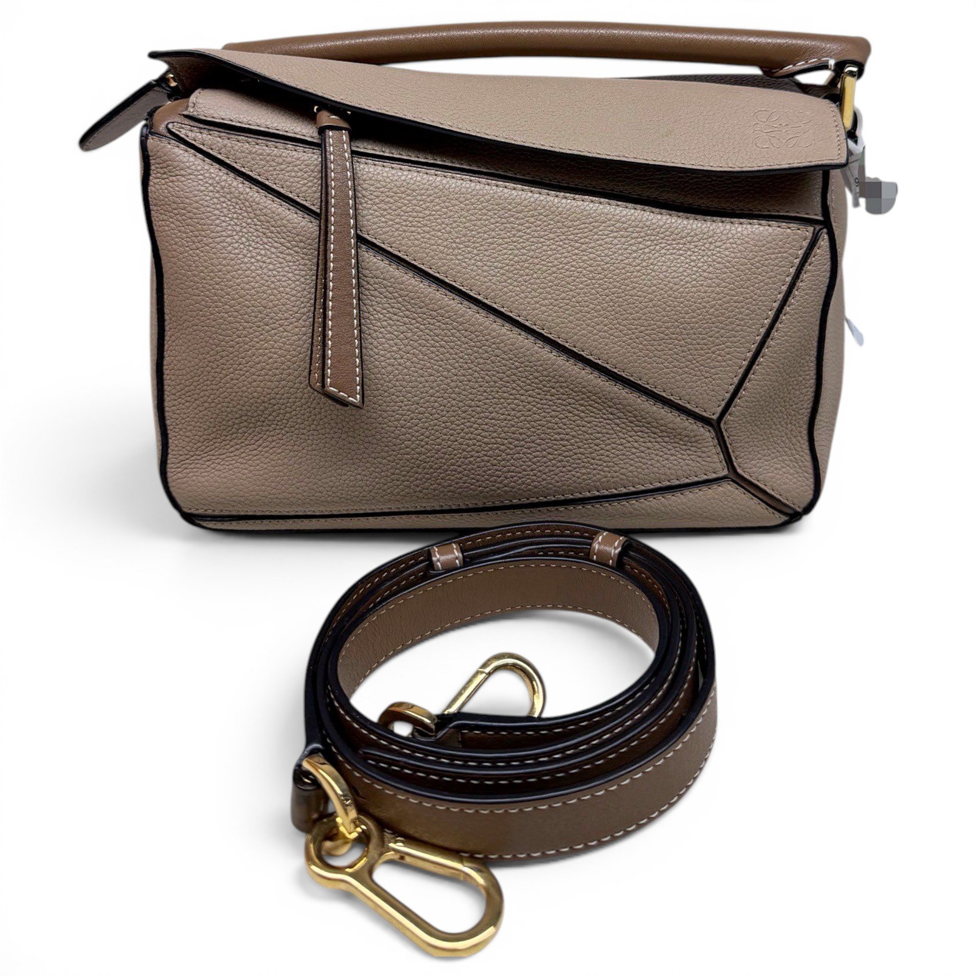 Puzzle leather handbag