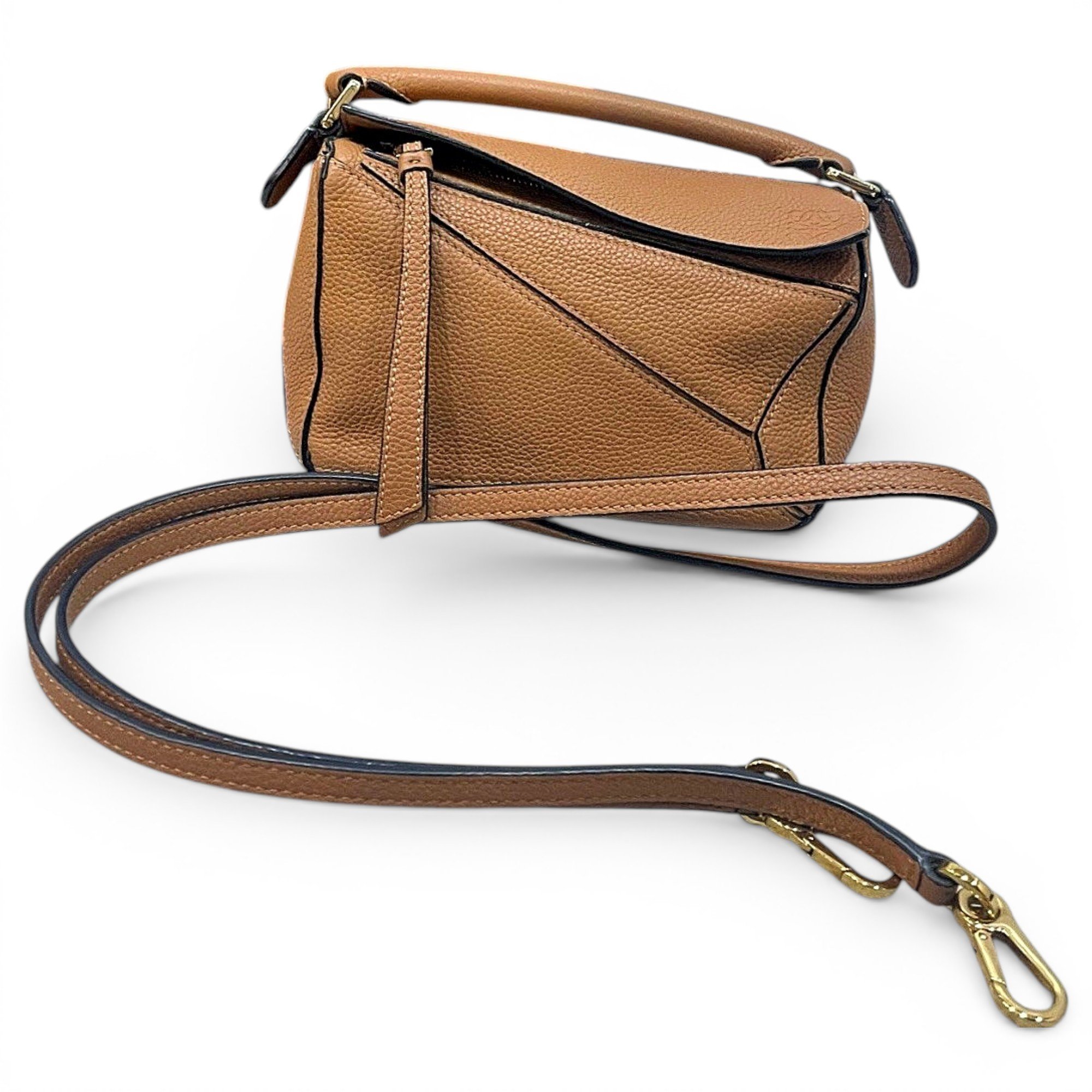 Puzzle leather handbag