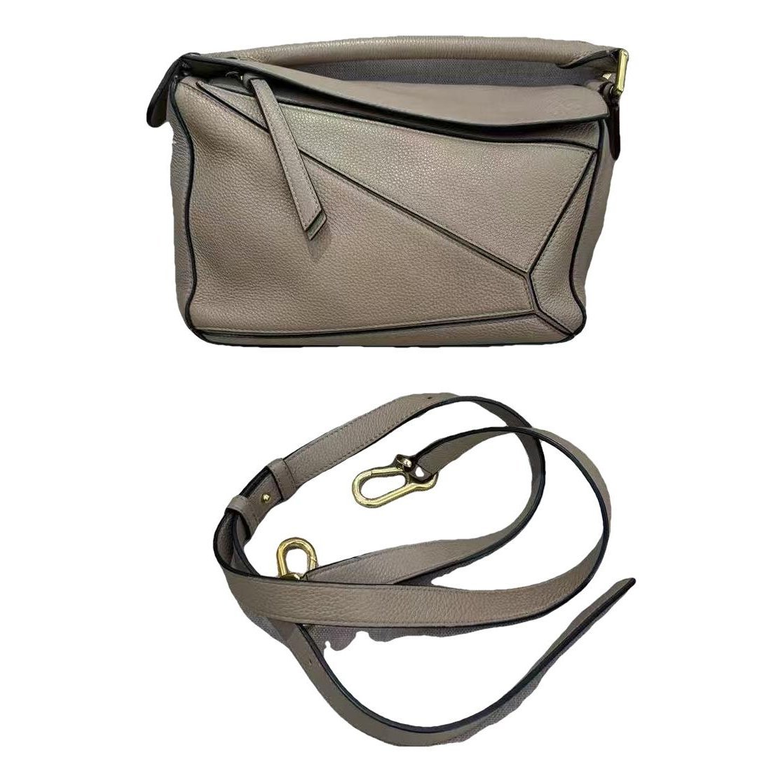 Puzzle leather handbag