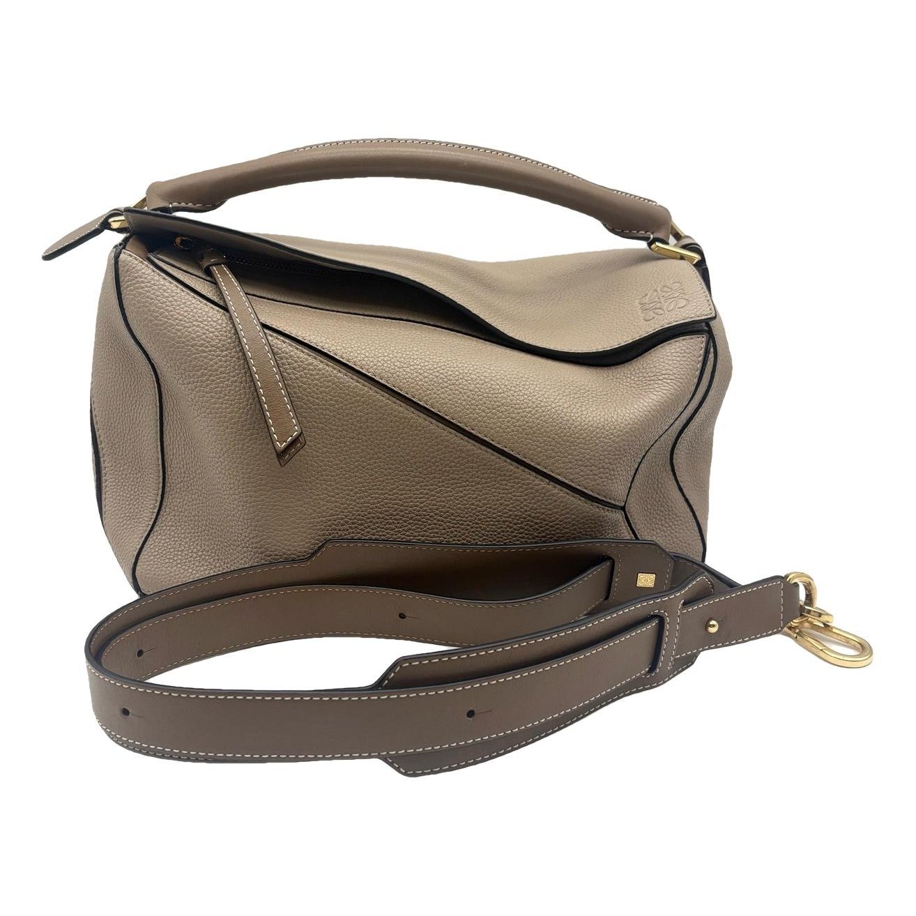 Puzzle leather handbag