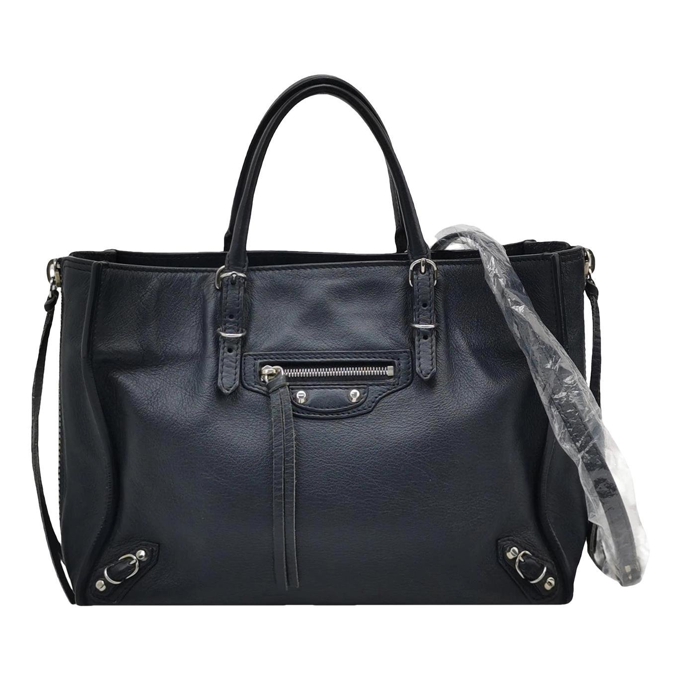 Papier leather handbag