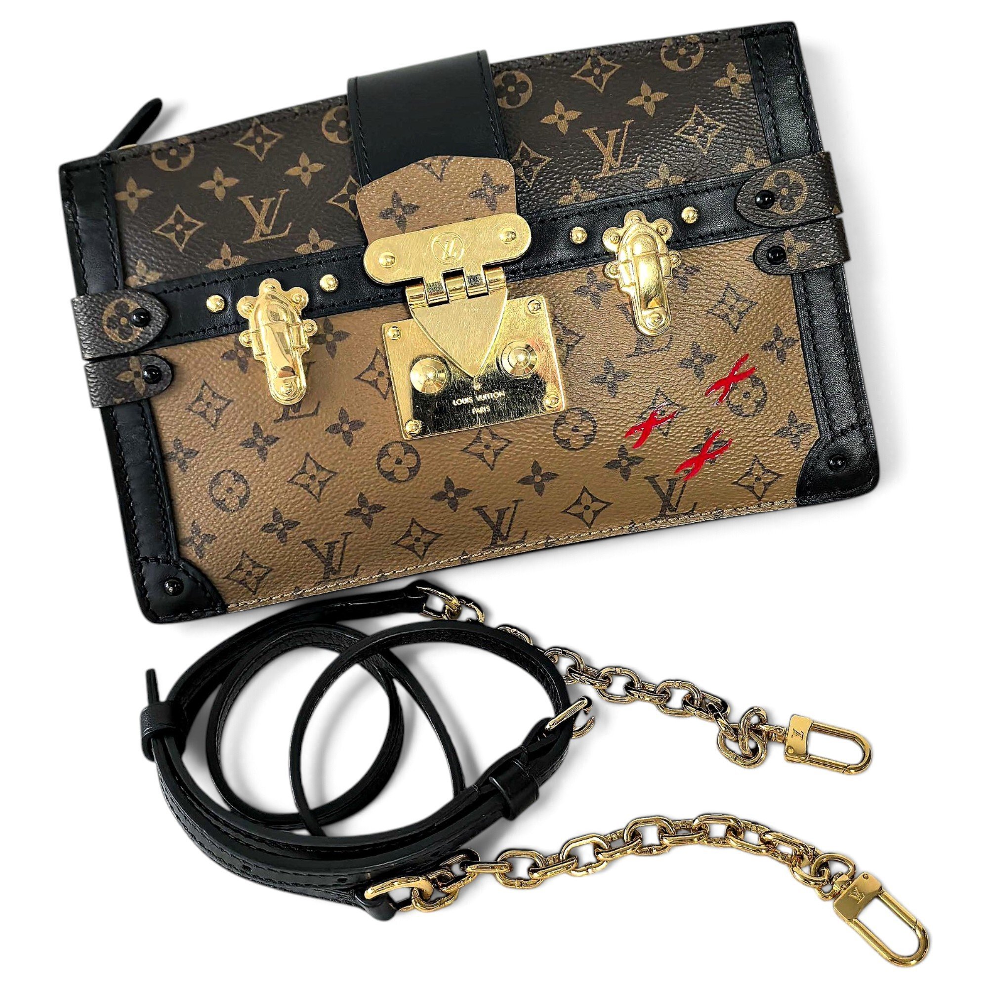 Pochette Trunk leather handbag